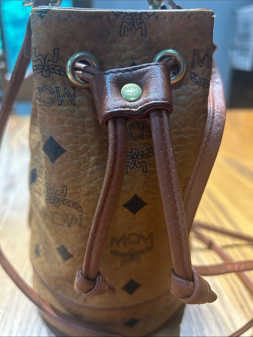 MCM Cognac Brown Monogram Leather Drawstring Mini Bucket Bag - Picture 2 of 11